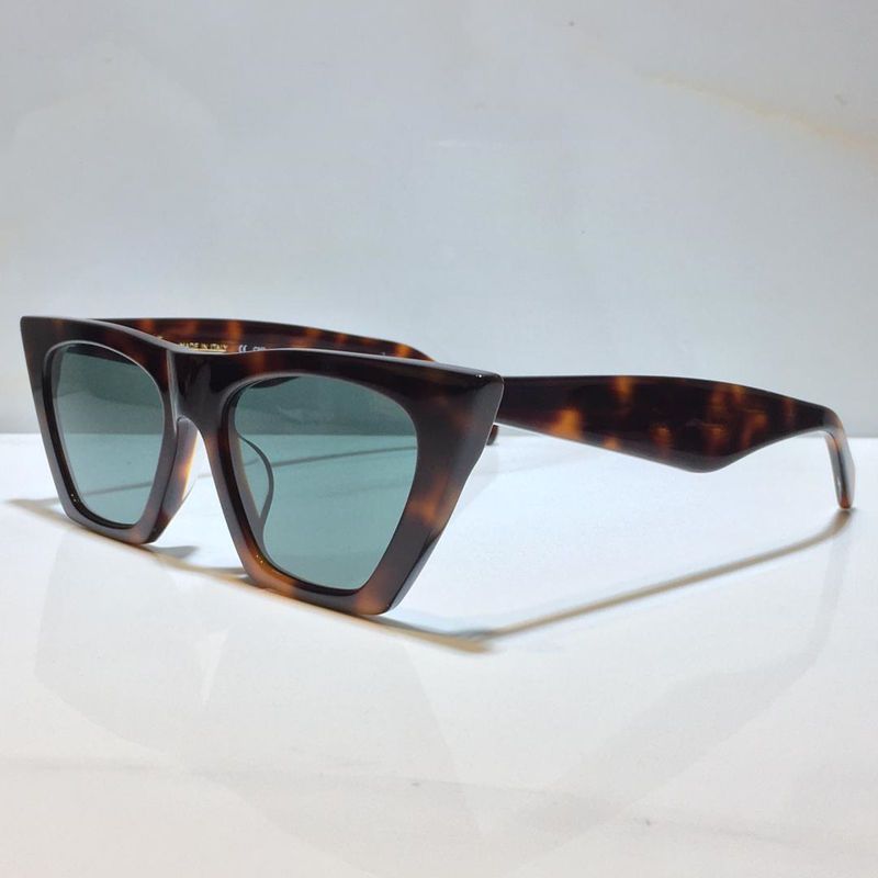 amber frame Gradient green lens