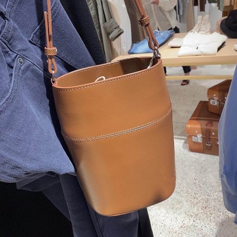 Compra Bolsos De Noche Cubo De Cuero Vintage Para Mujer Bolso De Color  Sólido Diseñador De Mano De Gran Capacidad Costura Simple 2021 Barato |  Entrega Rápida Y Calidad | Es.Dhgate