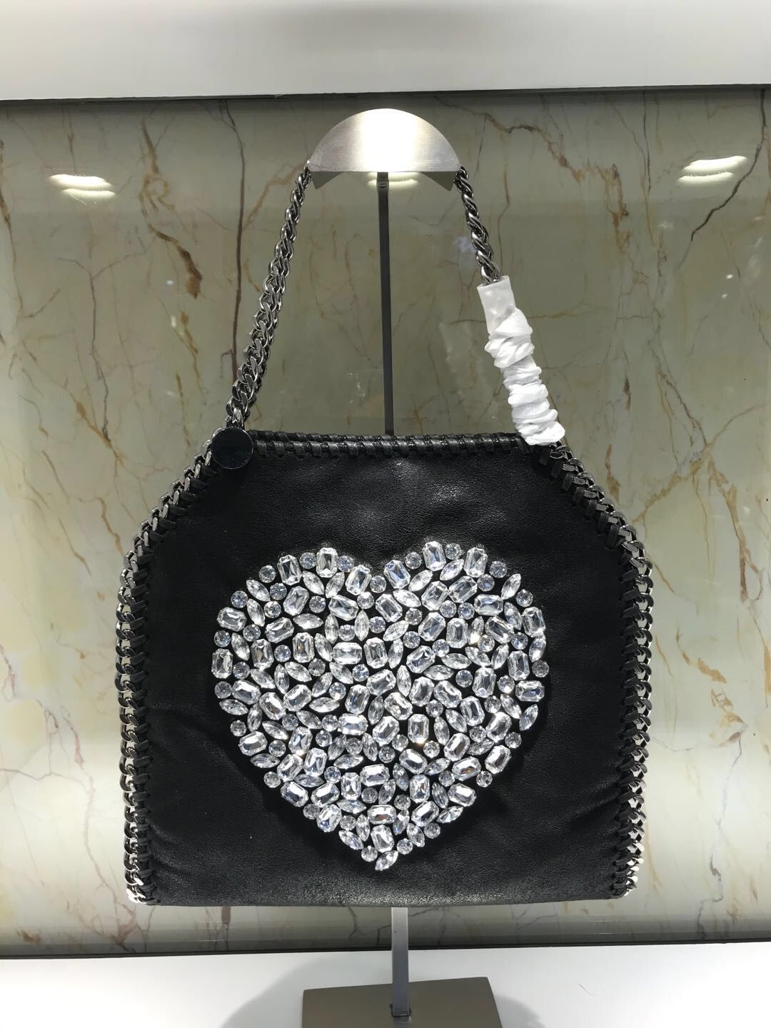 Black heart-shaped silver chain