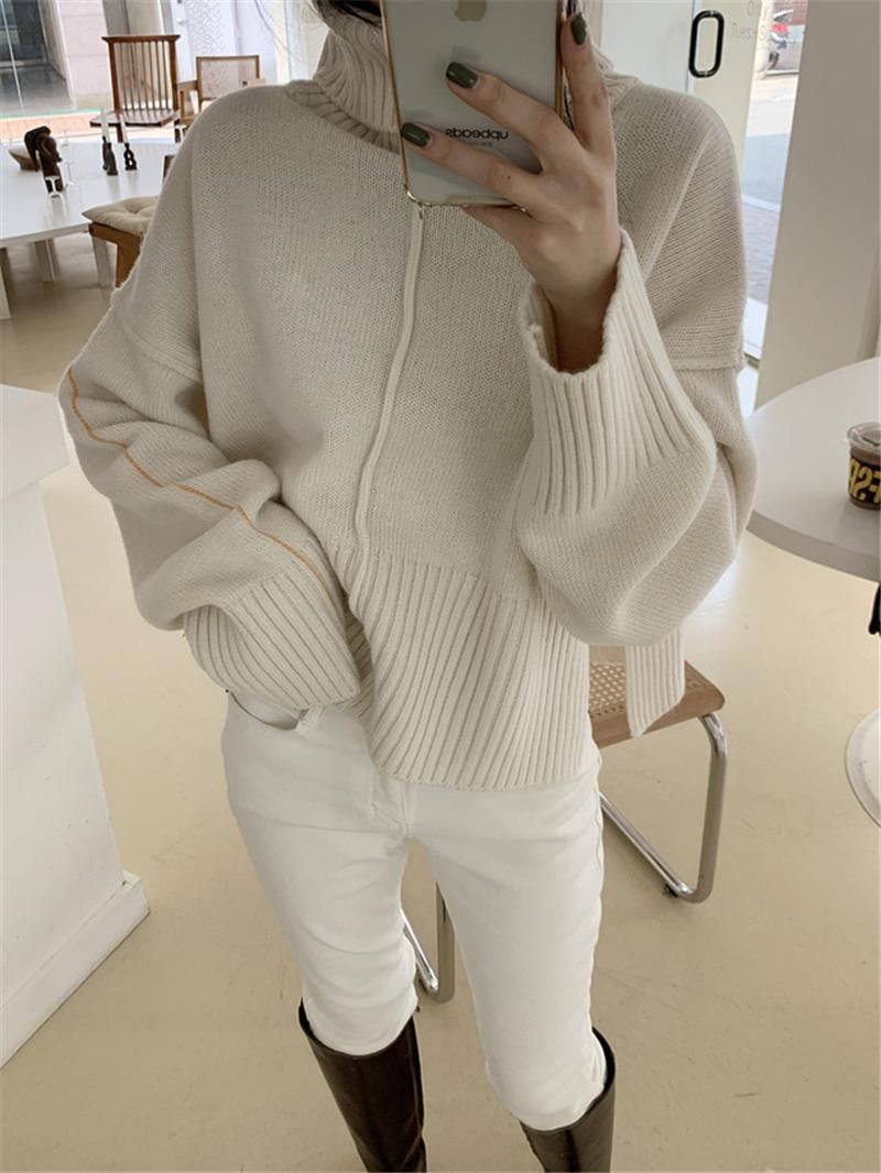 white sweater