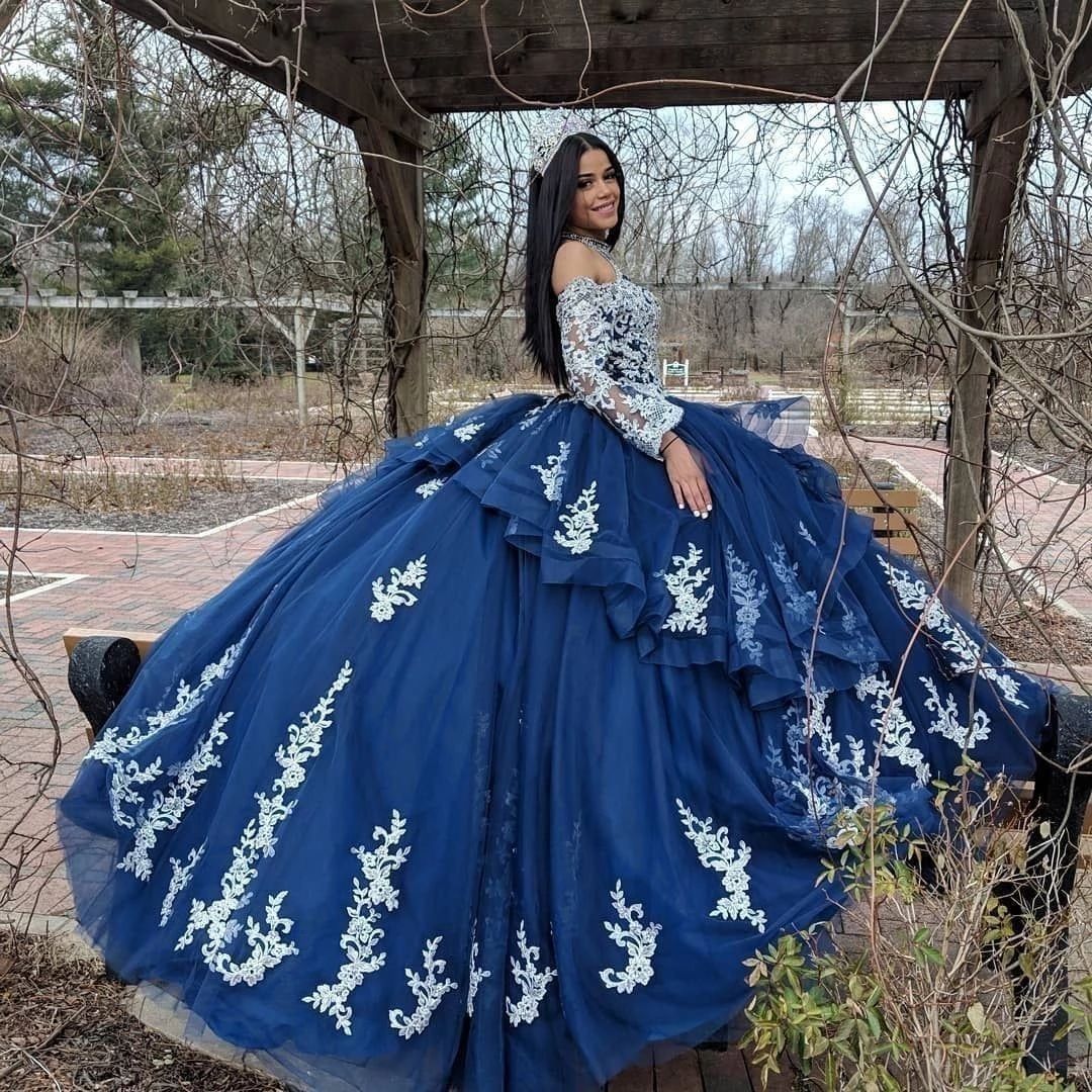 Elegantes vestidos de quinceañera azul marino con apliques de encaje blanco Mangas largas Bola de bolas Elegantes vestidos de quinceañera azul marino con apliques de encaje blanco Mangas largas Bola de bolas
