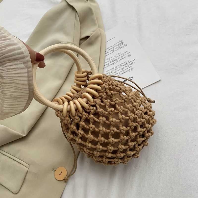 Compra Mango De Anillo Piezas De Diseño De Tejido A Cielo Abierto Bolsas  Para Mujeres 2022 Bolsa De Viaje De Verano Con Bolsos De Bolsos Bolsas De  Playa Femenina Tejido De Bolsas
