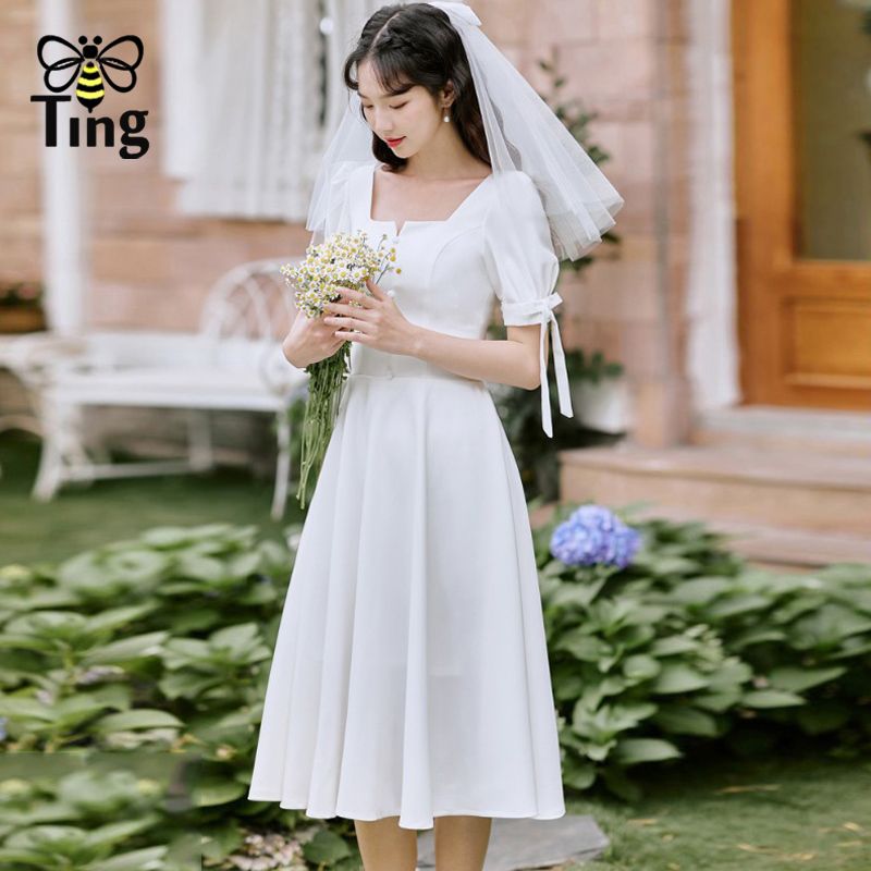 Compra Vestido Clásico Dulce Al Aire Libre Vestido Blanco Elegante Un  Elegante Una Línea De Manga De Hojaldre Vestidos De Rodilla Longitud De  Moda Princesa Elbise 210513 Barato | Entrega Rápida Y