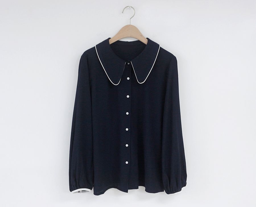 Blusa azul.