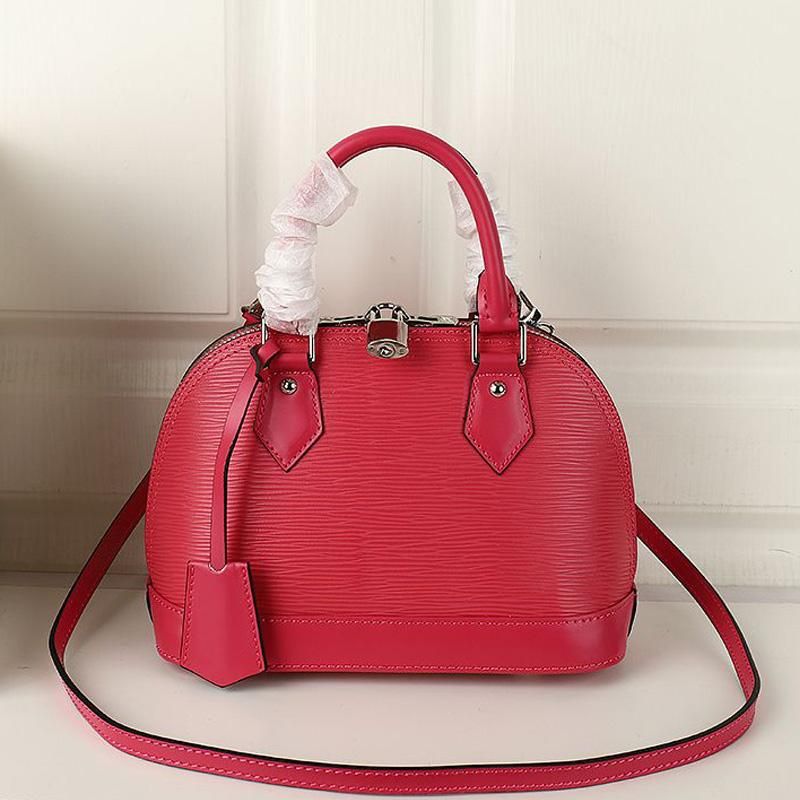 Mujeres Cruz Cuerpo Bolso Bolsos de cuero genuino Agua ondulada Shell Forma de cáscara de alta calidad Cerradura de bloqueo Hardware Strap de hombro desmontable