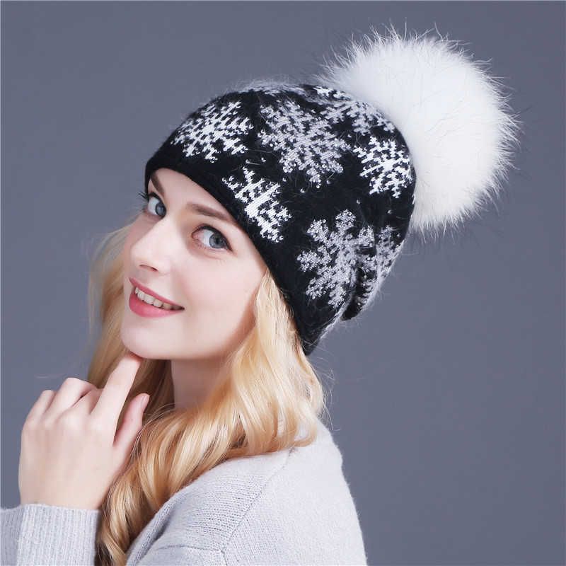 Cappello nero bianco pom