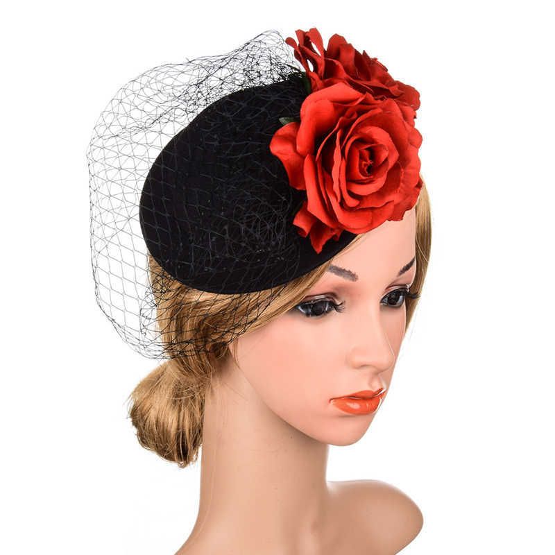 Black Netted Fascinator Hat With 2 Red 