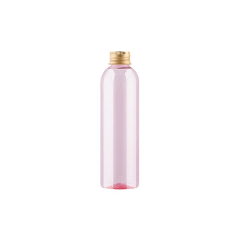 Розовая бутылка золотая крышка