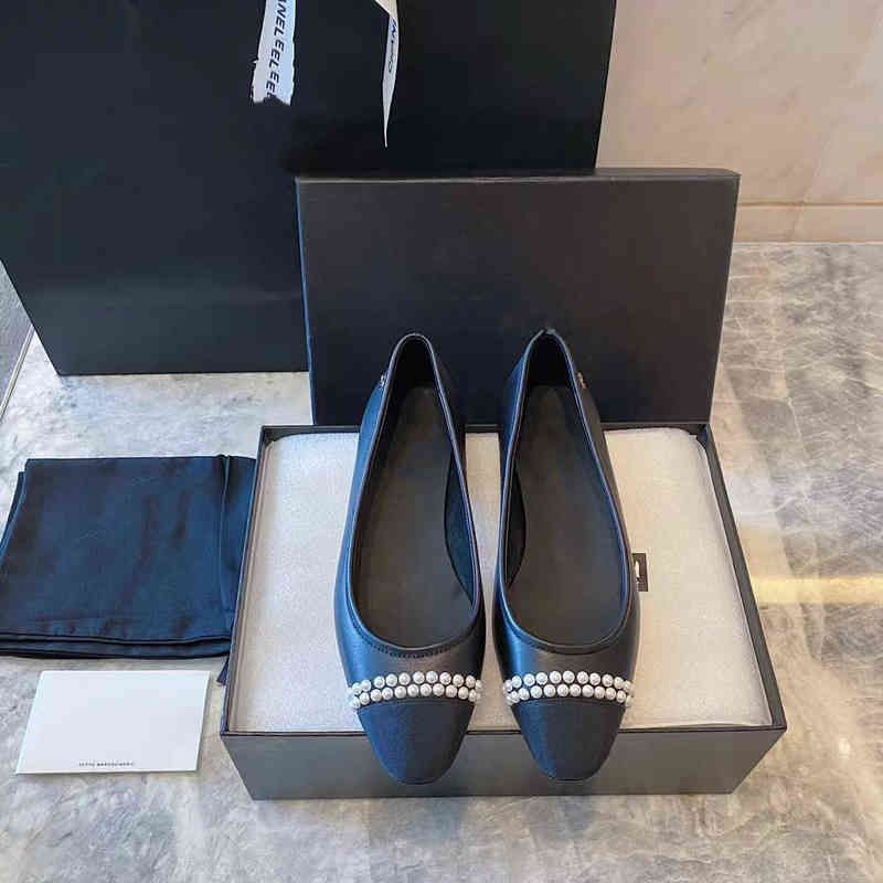chaussures à semelle plate noire (type de perle)
