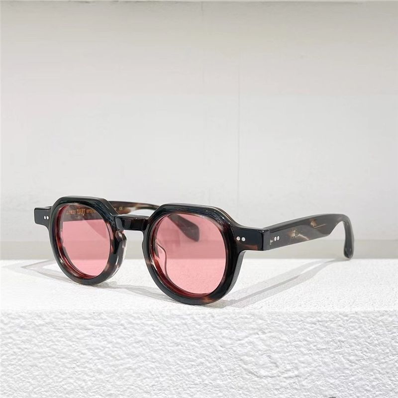 Amber Frame Pink Lens