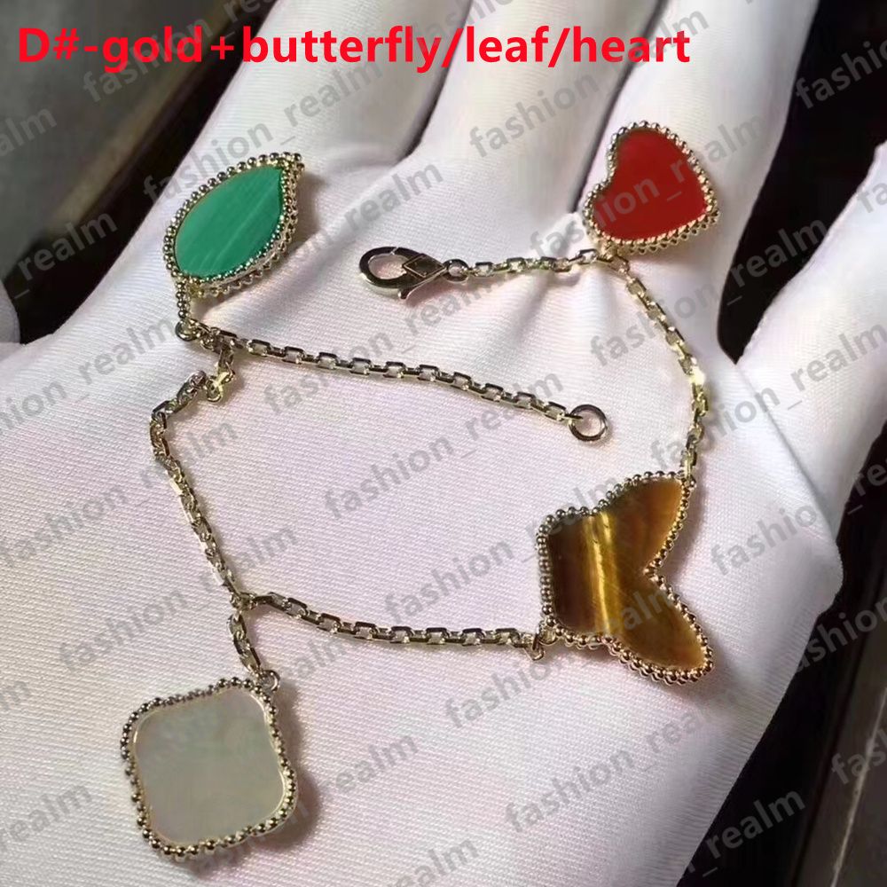 D # -Gold + papillon / feuille / coeur