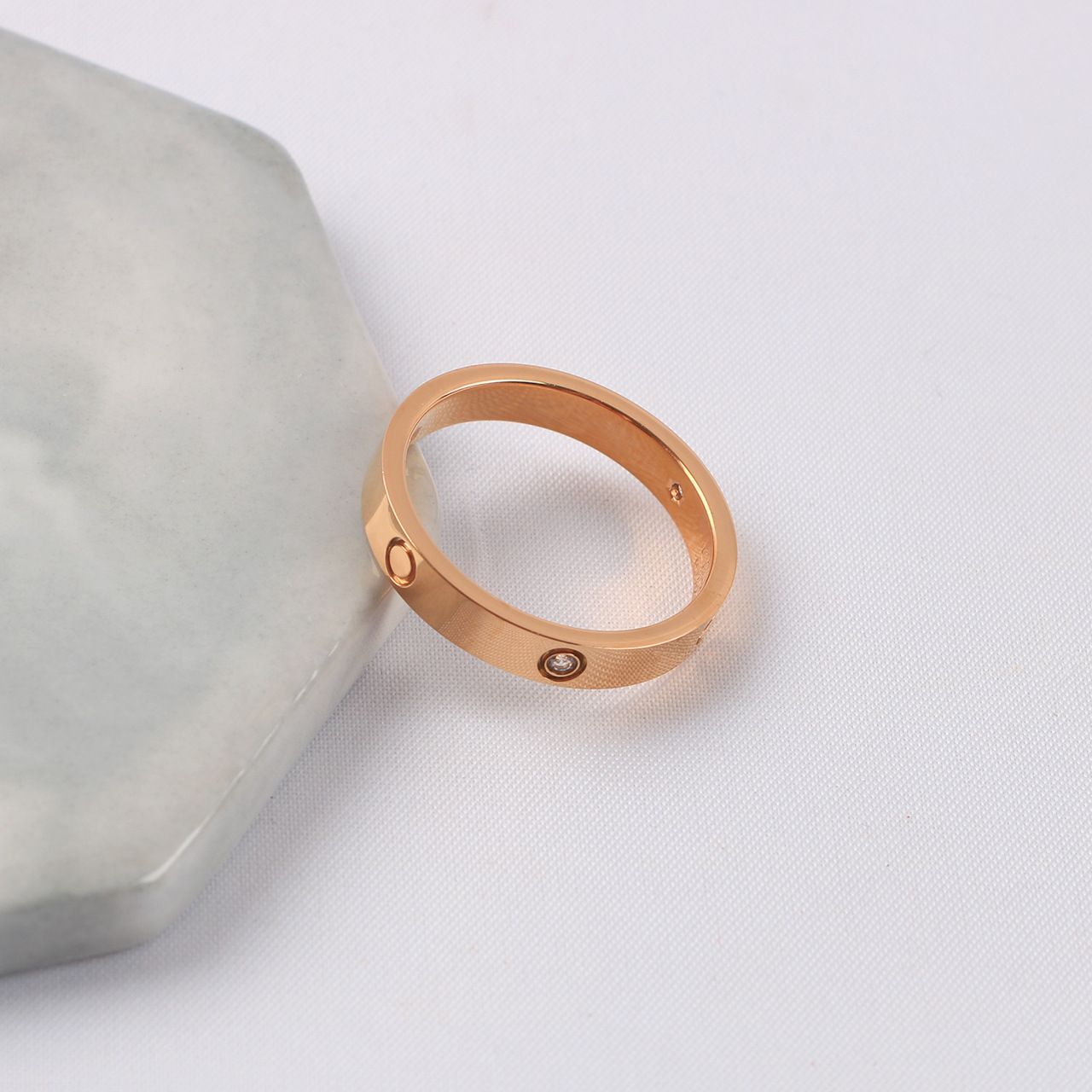 4mm rose gold with stone