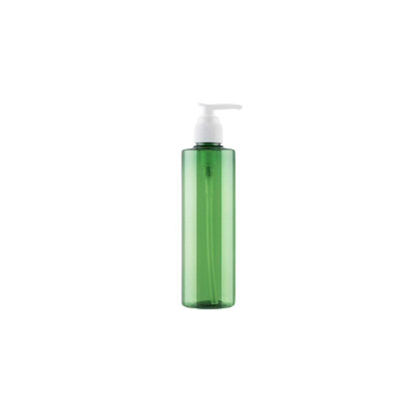 Grön flaska vit pump