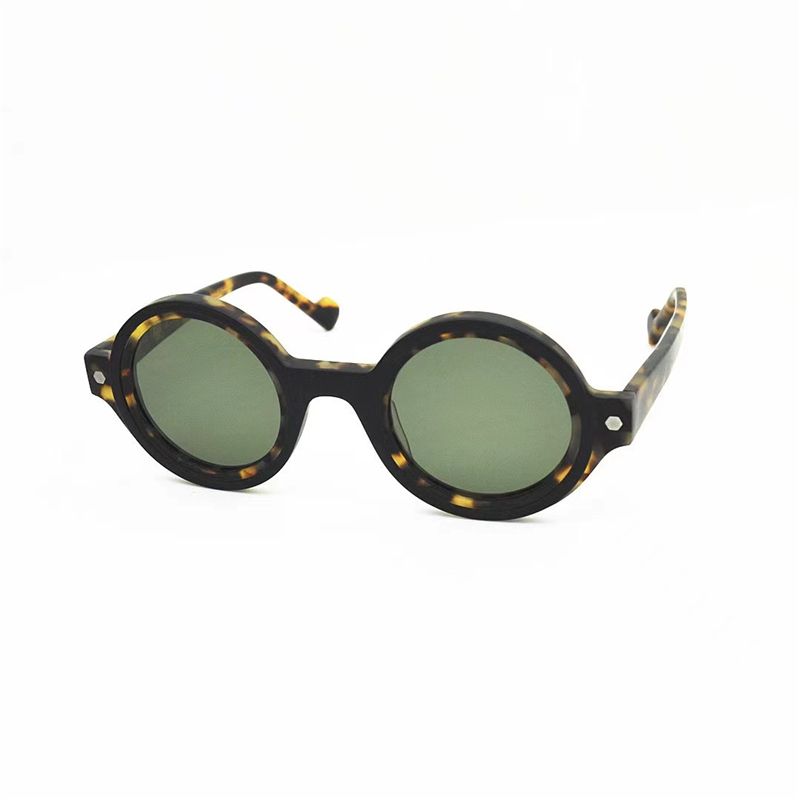 Amber frame groene lens