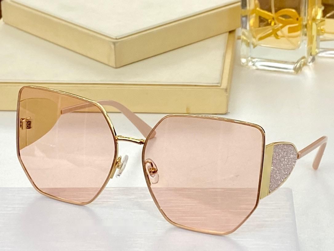 Gold frame pink lenses