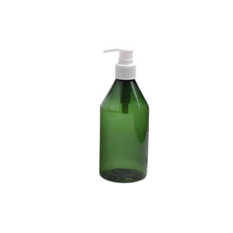 Grön flaska vit pump