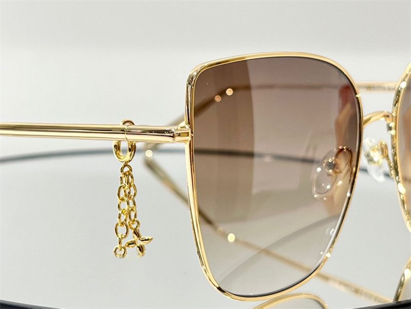 Luxury Cat Eye Sunglasses With Metal Pendant Designer Ladies Evening  Scarves For Avant Garde Summer Style From Brandshu, $10.85