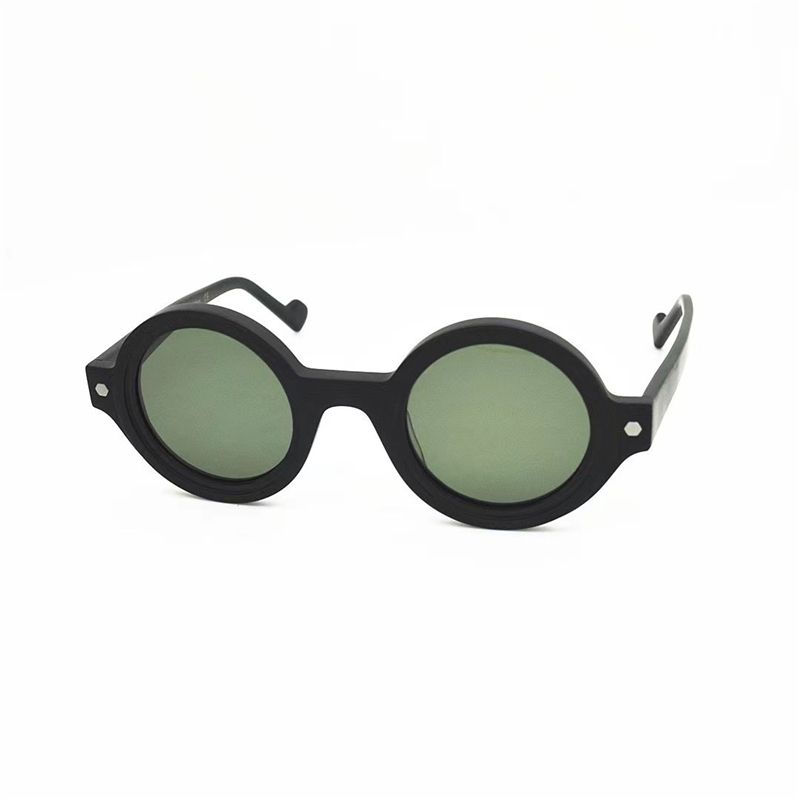 black frame green lens