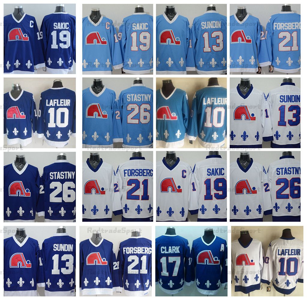 Mens Quebec Nordiques Vintage 19 Joe Sakic Hockey Jerseys Baby Blue 26  Stastny 13 Mats Sundin 21 Peter Forsberg 10 Guy Lafleur Jersey #17 Wendel  Clark Shirts From Redtradesport, $31.09
