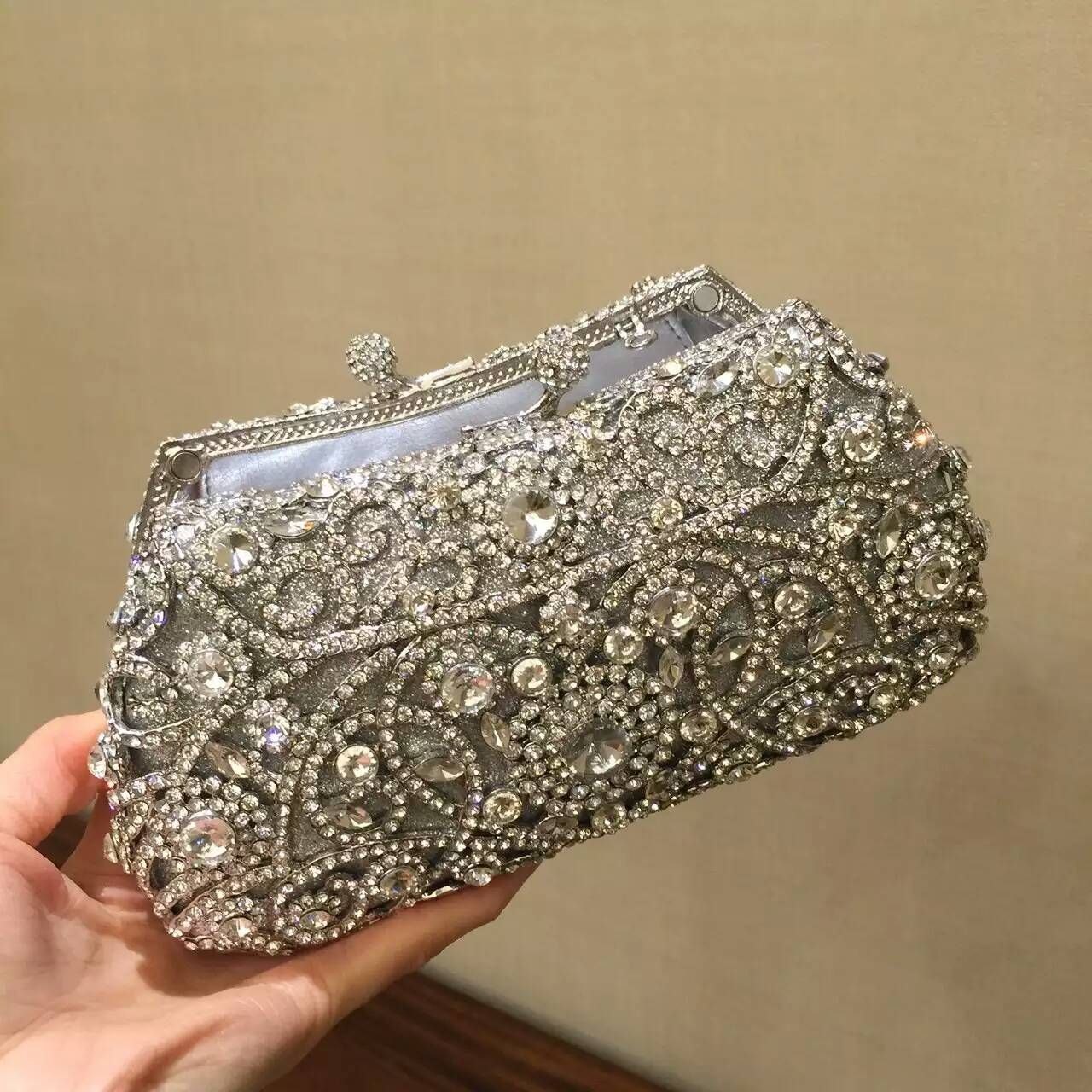 silver evening bag with rhinestones