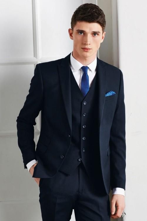 black jacket blue tie