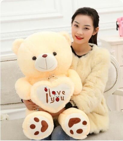 holding a stuffed animal