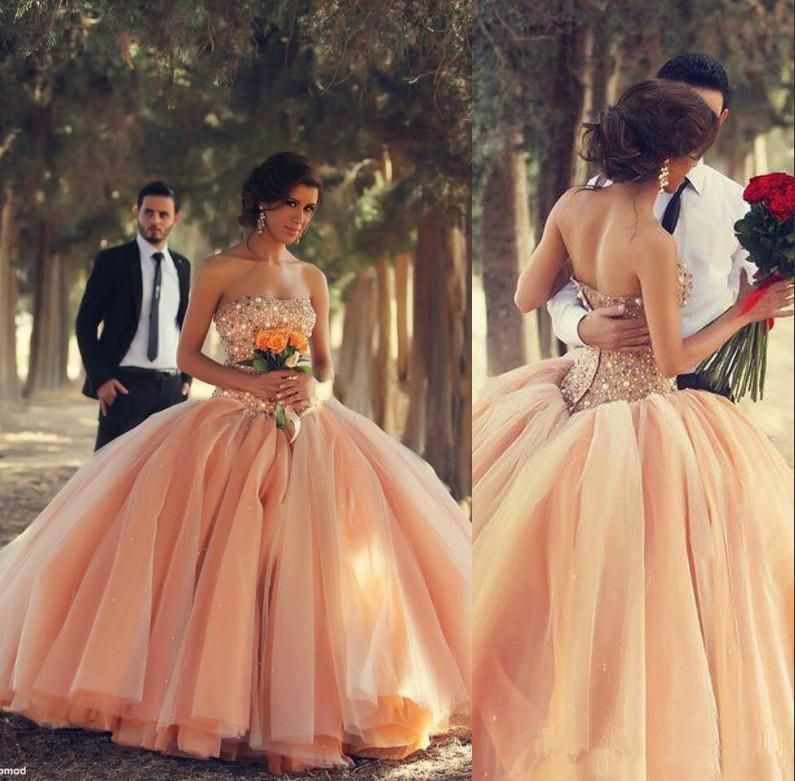 peach and gold quinceanera dresses