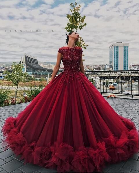 red puffy prom dress