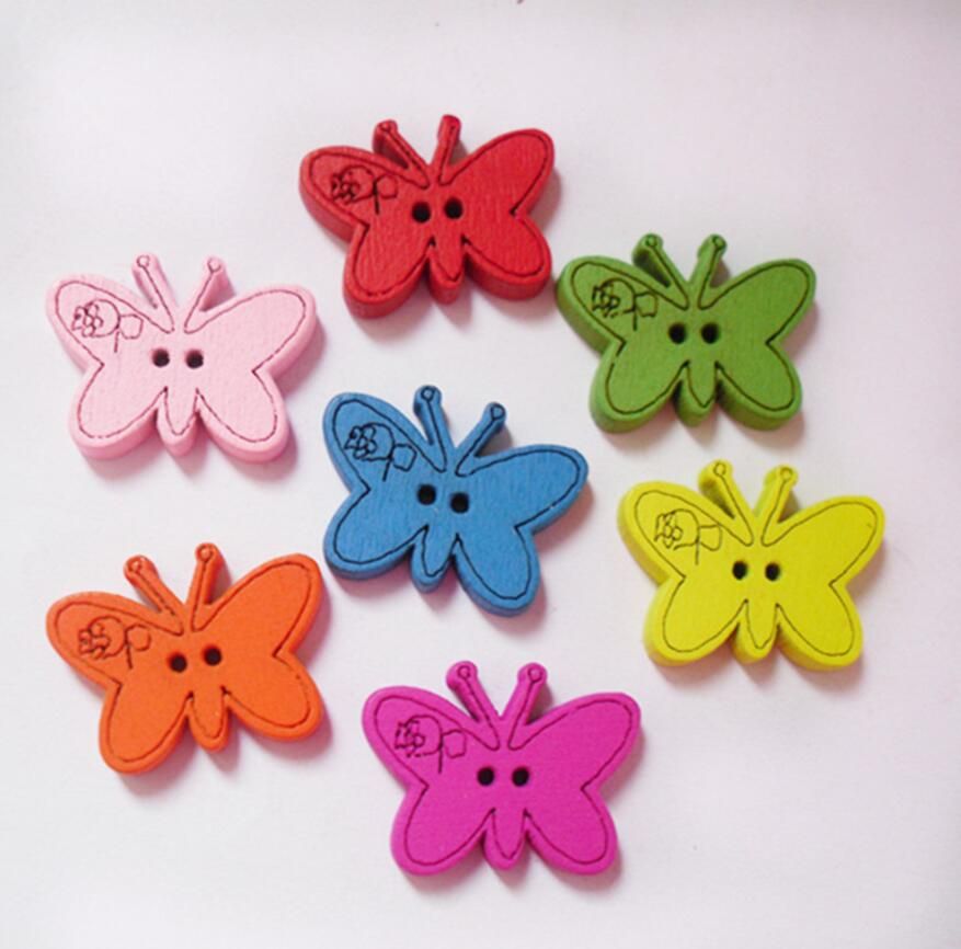 100pcs 22 * 17mm colores surtidos Botones de la mariposa de madera de dibujos 100pcs 22 * 17mm colores surtidos Botones de la mariposa de madera de dibujos