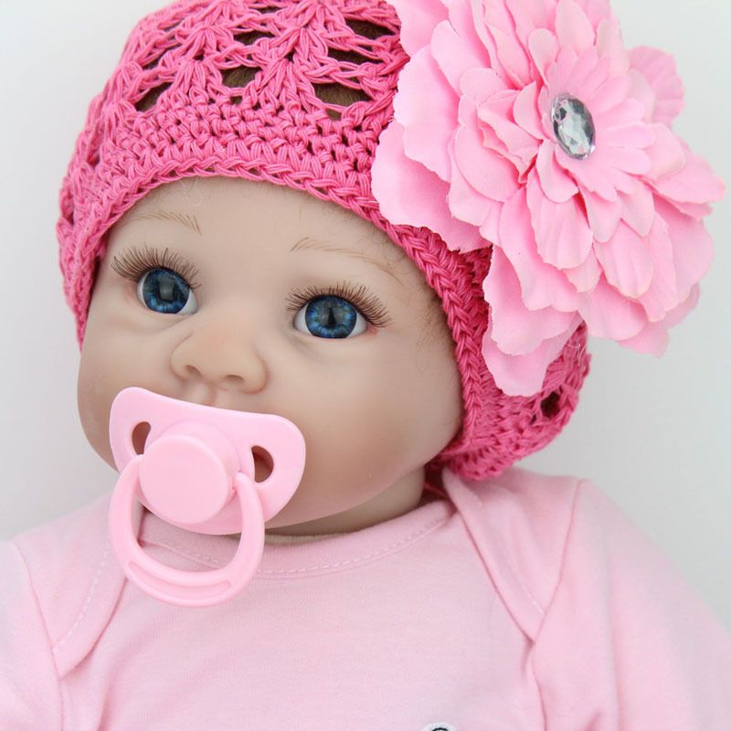 baby dolls with pacifiers