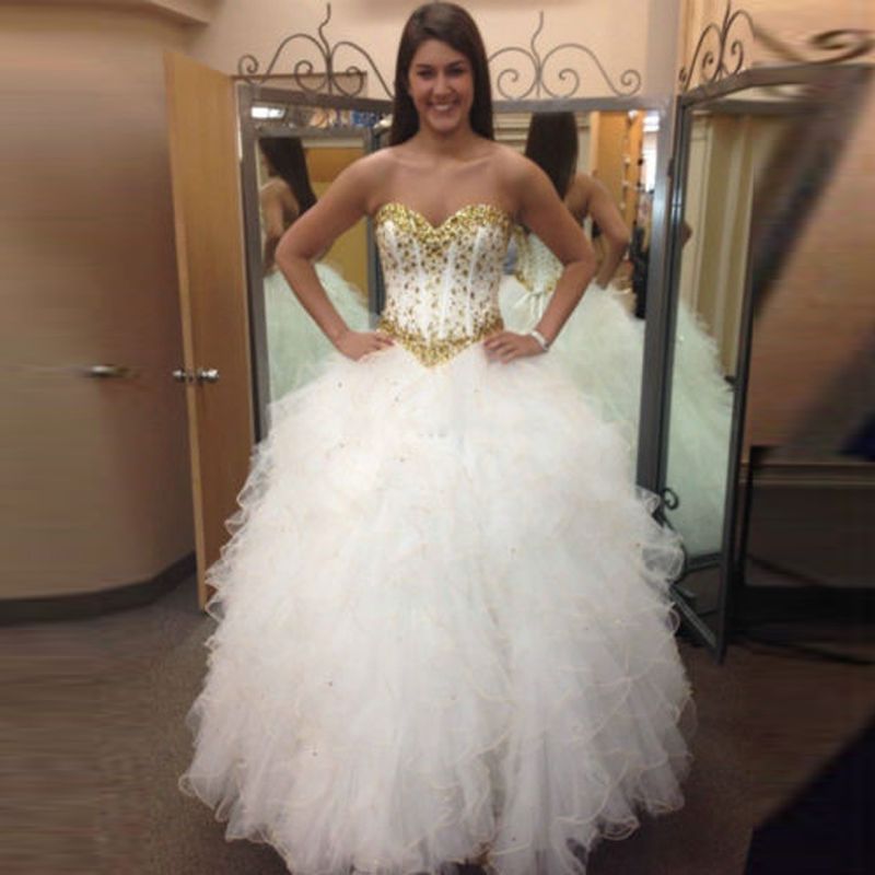 gold and white dama dresses