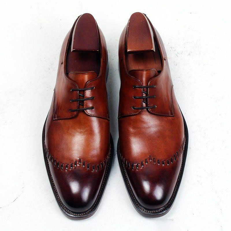 sapatos castanhos homem