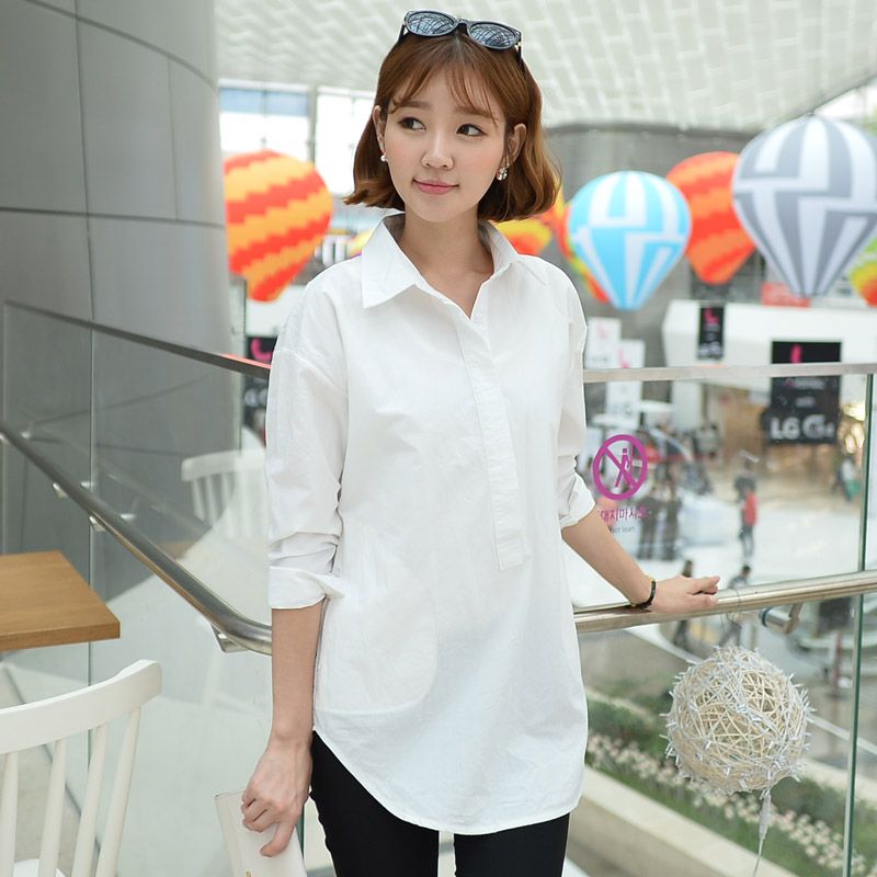 camisa blanca holgada