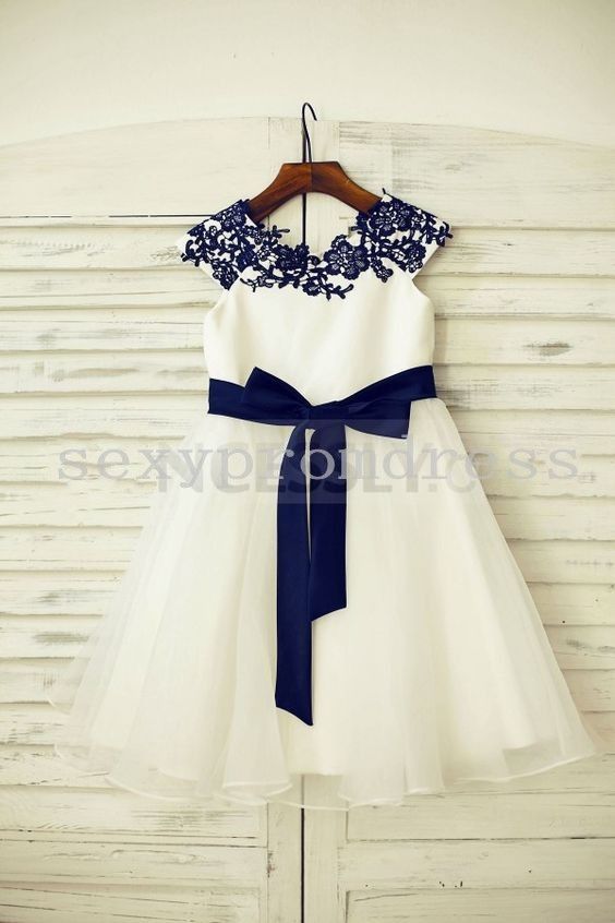 white flower girl dress with blue sash