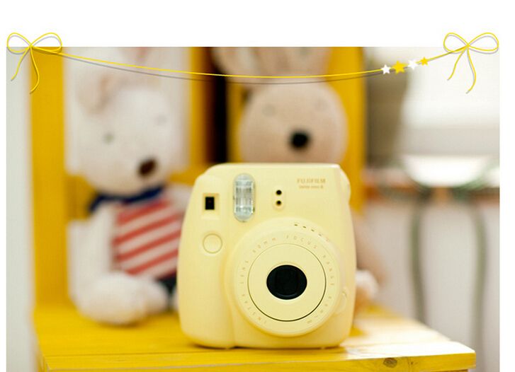 pastel yellow instax camera