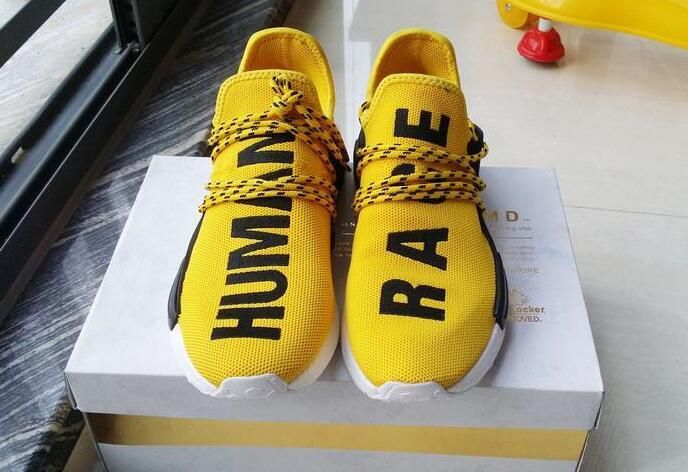 human race shoes yellow