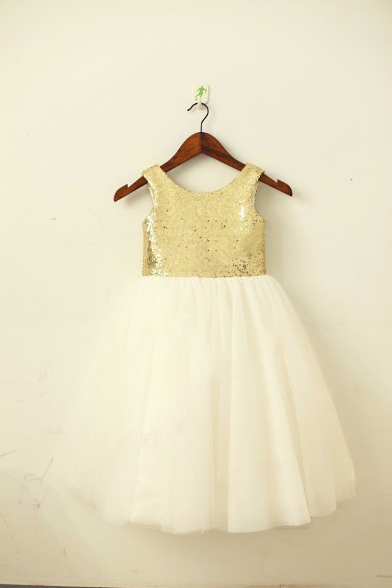 white flower girl dress with gold sash