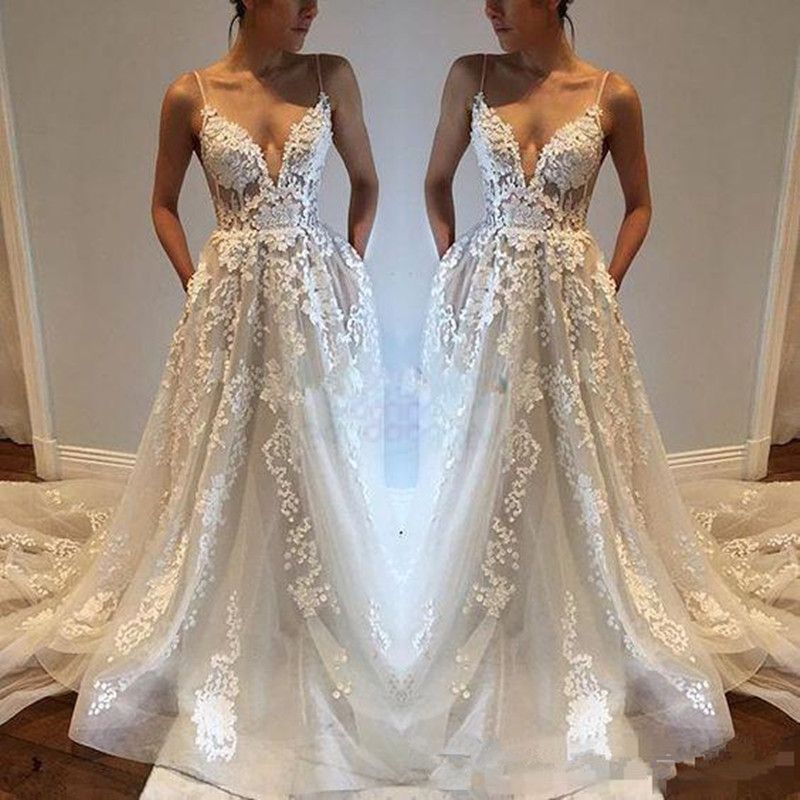 a line spaghetti strap wedding dress