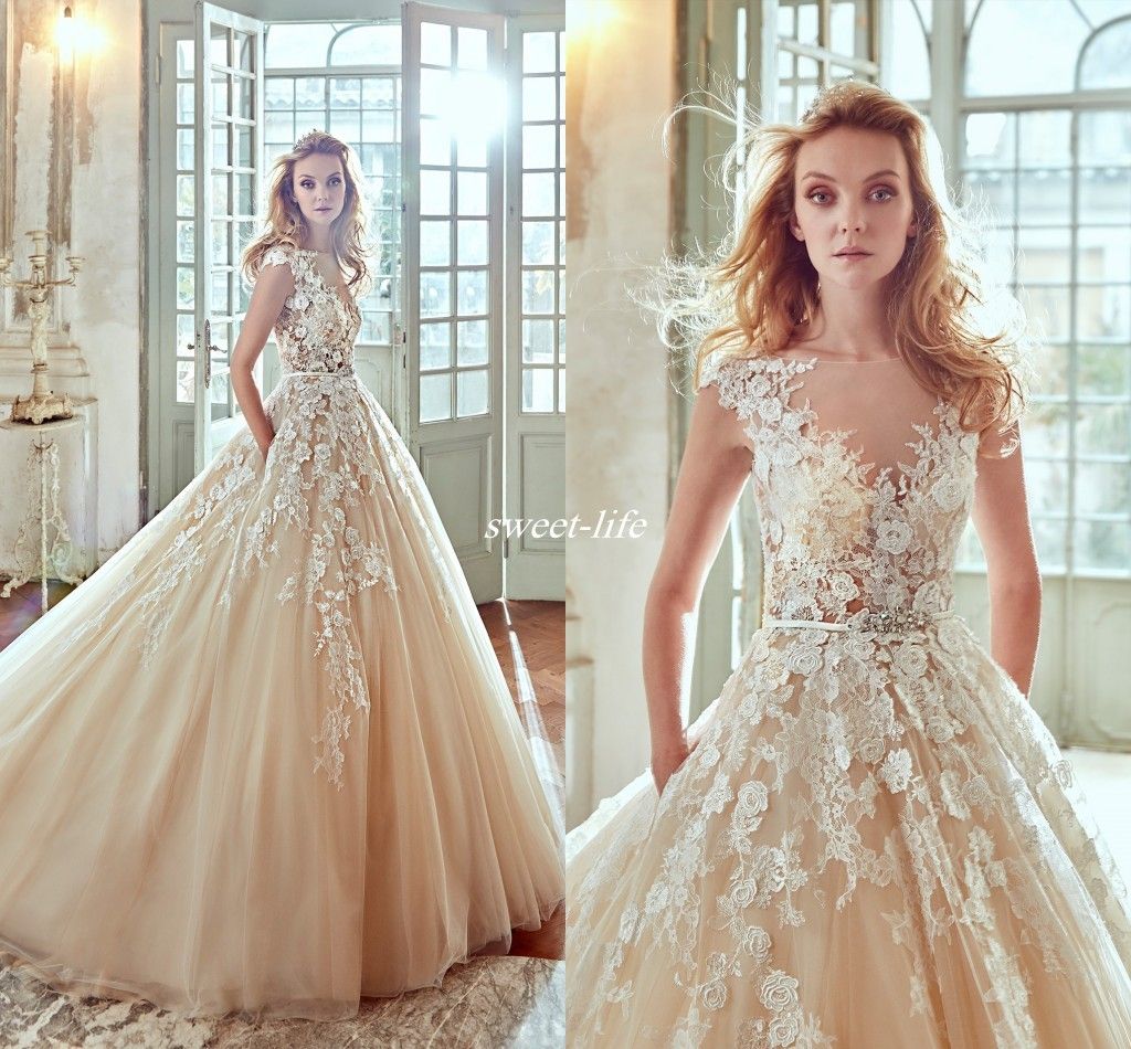 Discount Modest Champagne Lace Wedding Dresses With Pocket Illusion Neck Cap Sleeve Crystal Belt Chapel Train 2019 Vintage Bridal Wedding Gowns Cheap Prices Of Wedding Dresses Simple A Line Wedding Dress From