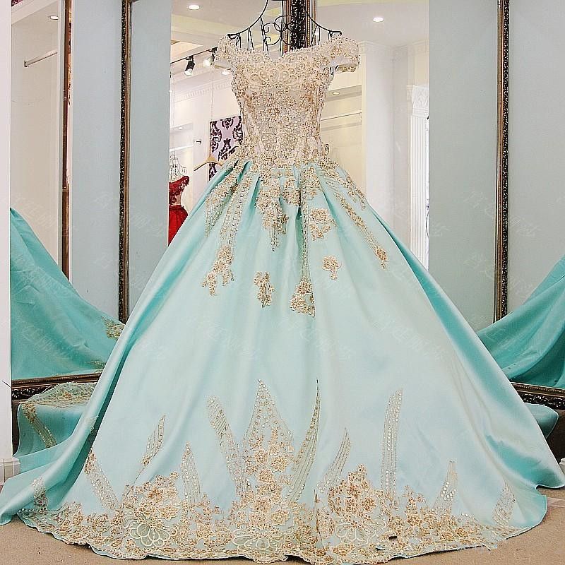 gold and mint green dress