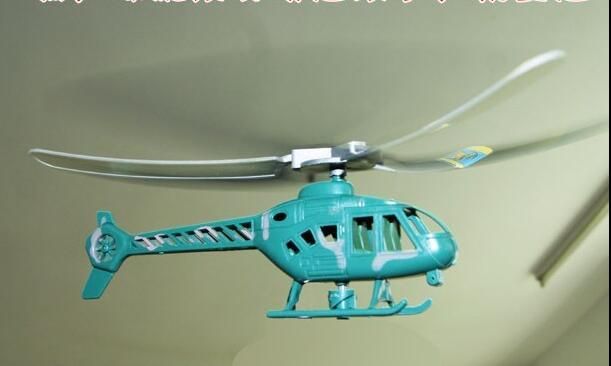 toy helicopter on a wire