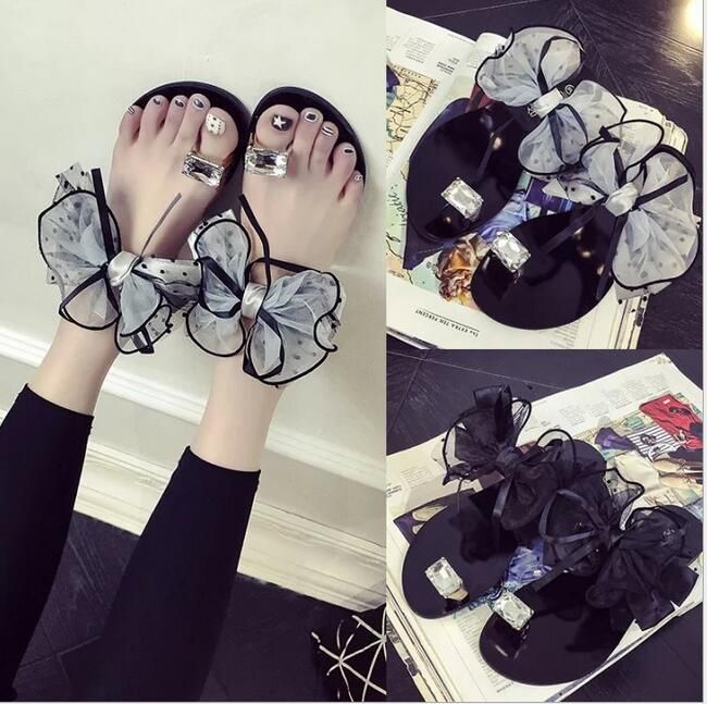 black bow flat sandals