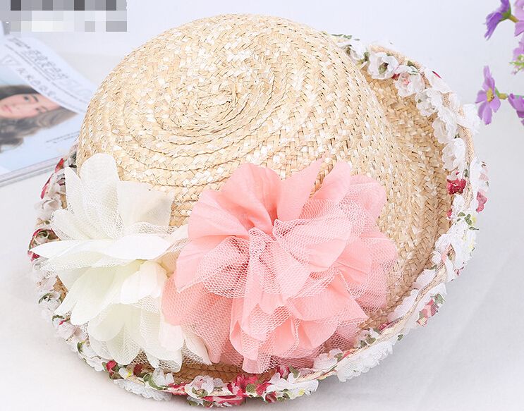 hat with flower on side