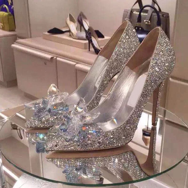 Cinderellas Glass Slipper Silver Diamond Wedding Shoes Pointed To The Bride In The Wedding Dress 