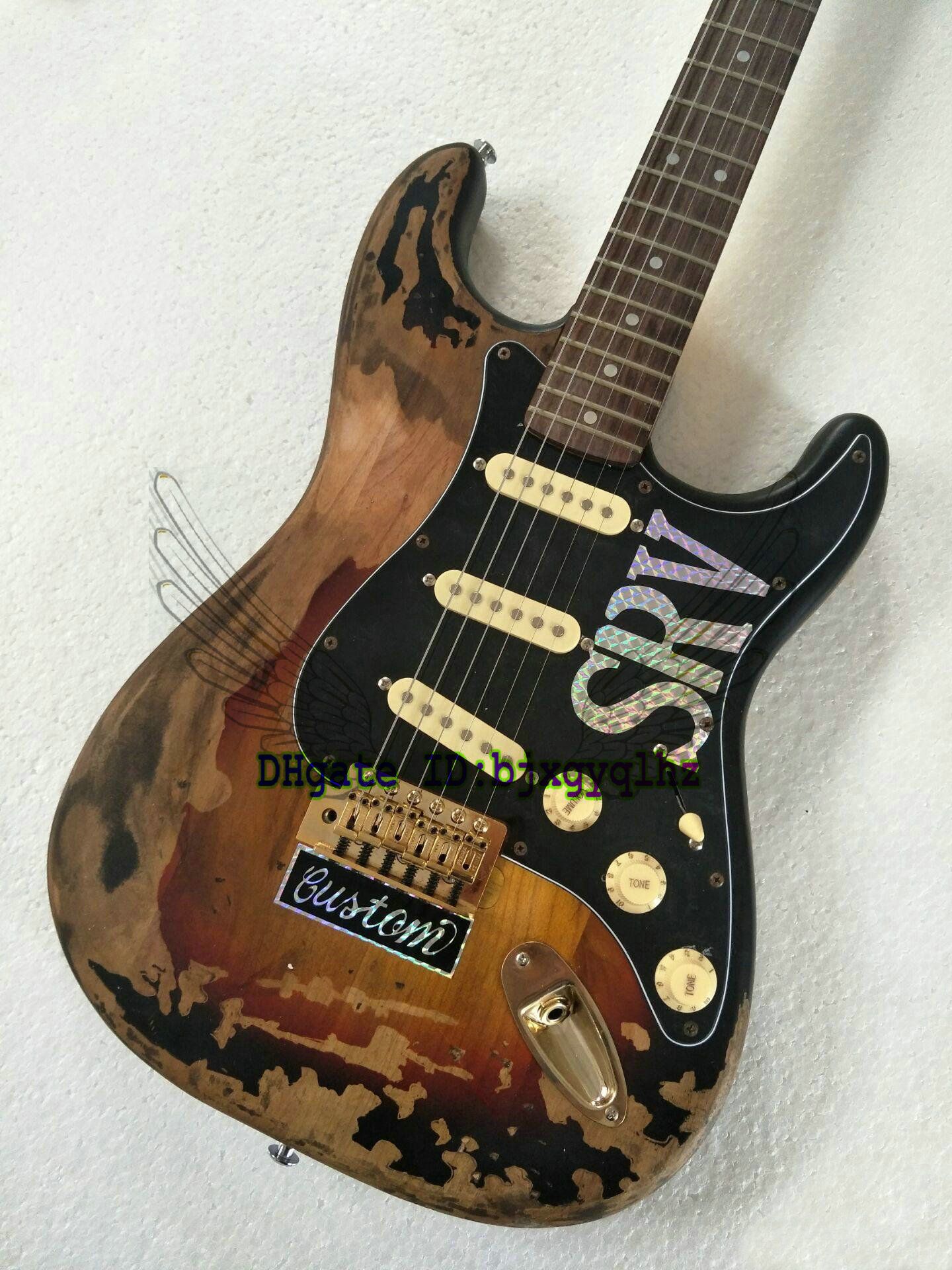 Compre Rare Guitar 10S Custom Shop Masterbuilt Edición Limitada Stevie Ray  Vaughan Homenaje SRV Number One ST Guitarra Eléctrica Vintage Brown  Wholesale A 296,51 € Del Bjxgyqlhz | Es.Dhgate.Com