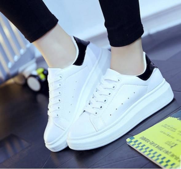 branded white shoes
