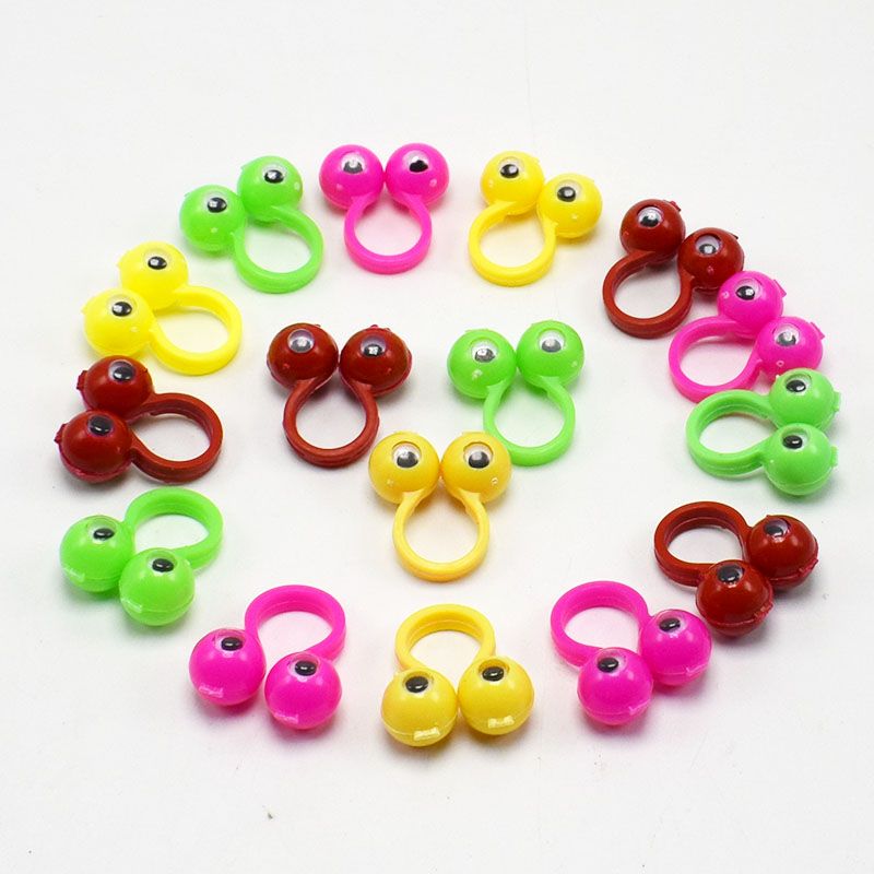 Compre 2000 Unids / Lote Anillos De Plástico Con Wiggle Eyes Finger Spies Eyes Regalo De Juguete Para La Fiesta De Cumpleaños De Los Niños De Color Al Azar DHL A 77,99