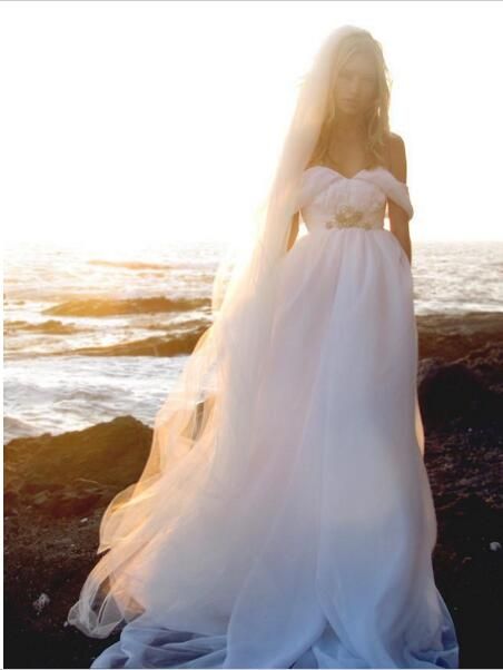 beach flowing wedding dresses