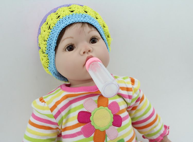 doll with dummy and bottle