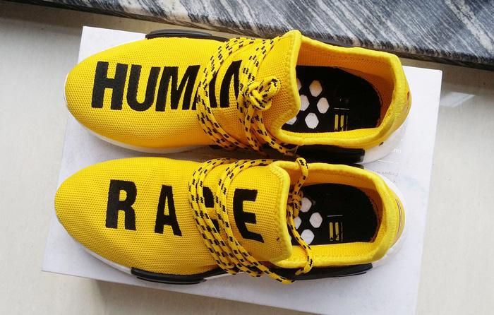 human race sneakers yellow